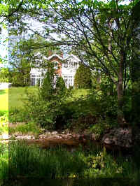 Running brook in front of House with Tree Shaded.jpg (55228 bytes)